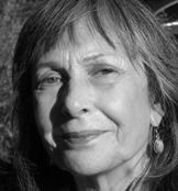 Headshot of Irma L. Ostroff, smiling at the camera.