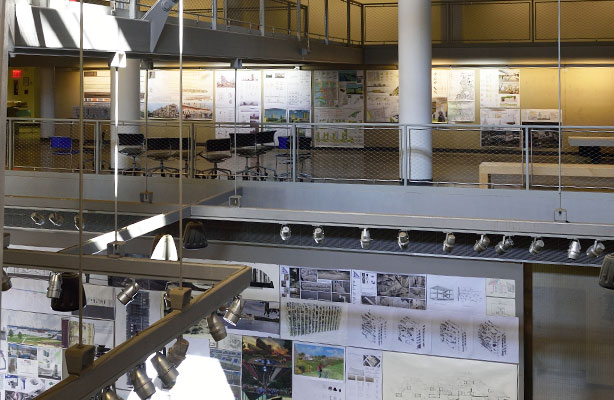 An interior view of the Spitzer School of Architecture, overlooking the pin-up wall in the atrium and the second floor.