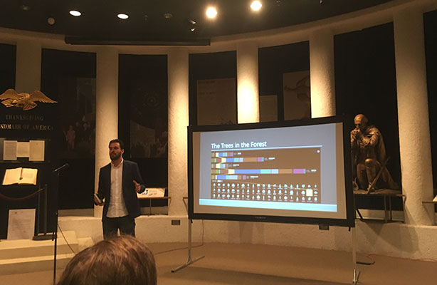 Nagel delivering presentation in in the Chapel of Thanksgiving