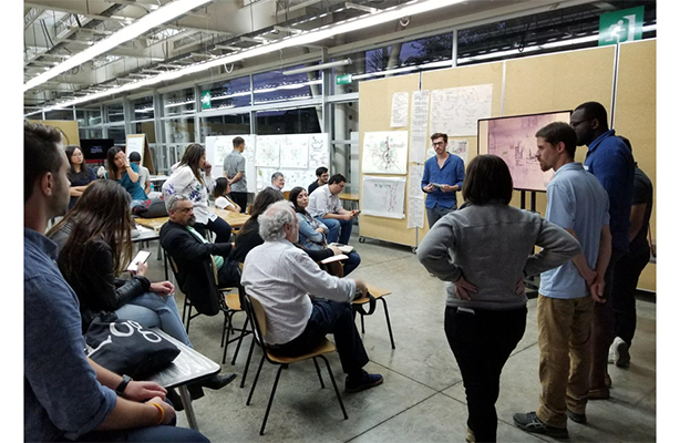 students discussing work