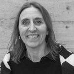 Headshot of Monica Bertolino, smiling at the camera.