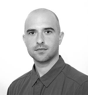 Headshot of John Yurchyk, looking at the camera.