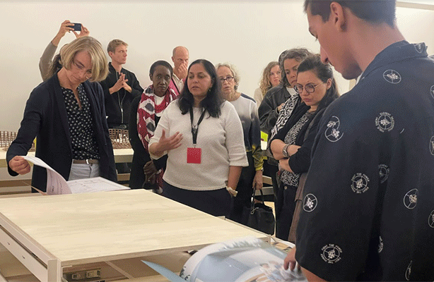 Professor Vyjayanthi Rao, center (with red credential) co-curated the Multiplicity section of the main exhibit; photo courtesy Pedro Cruz Cruz
