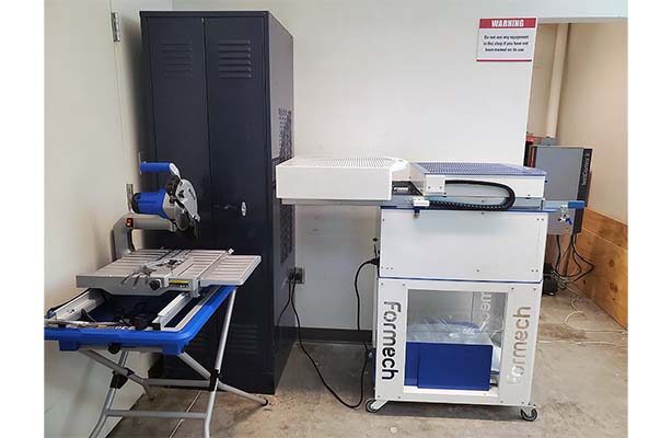 Interior view of the ABC Lab at the high-quality Spitzer School of Architecture, featuring the equipment.