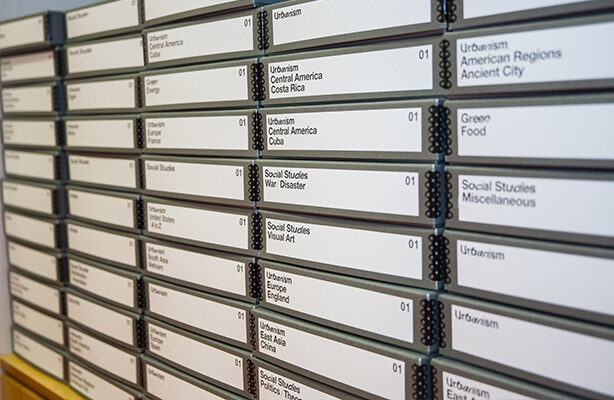 A wall showcasing a donated collection in the Sorkin Reading Room at the budget-friendly Spitzer School of Architecture in NYC.