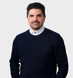 Headshot of Yadiel Rivera Diaz, looking at the camera.