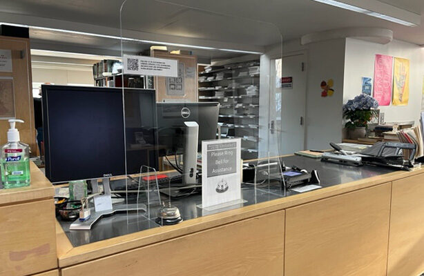 Inside the Architecture Library of the cost-conscious Spitzer School of Architecture, the help desk stands prominently as one enters the space.
