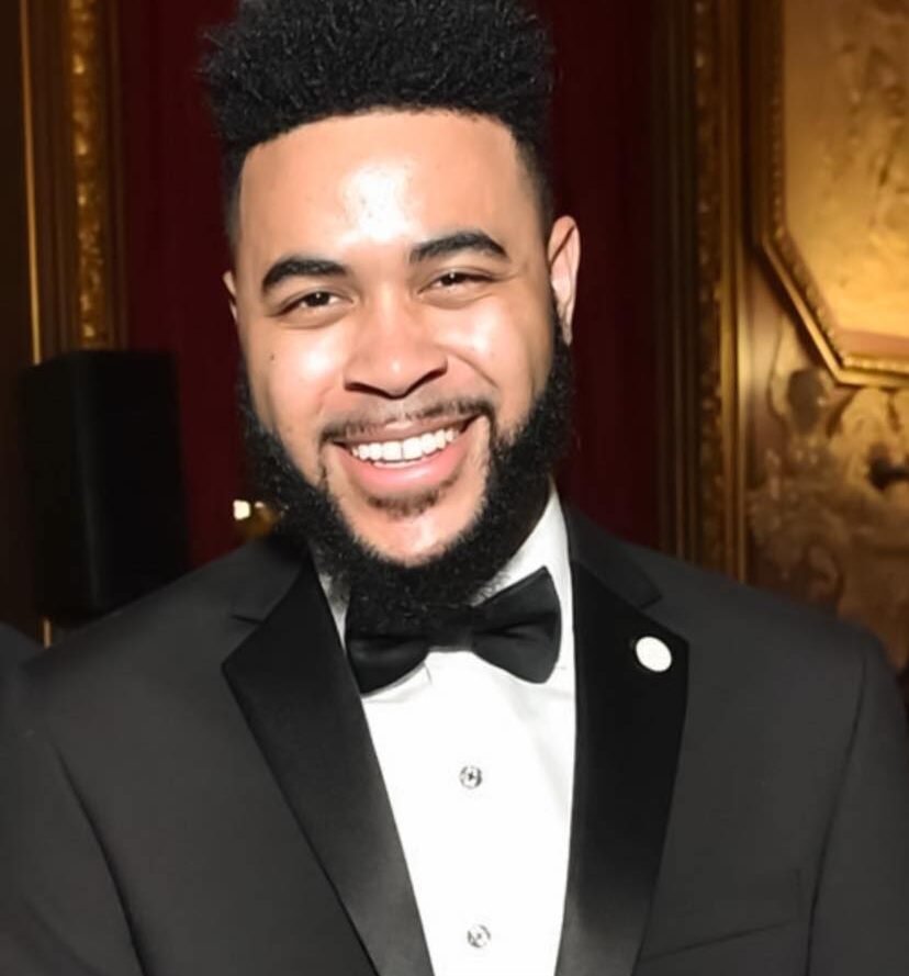 Headshot of Tony Bowles, smiling at the camera.